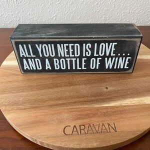 All you Need Is Love and a Bottle of Wine wooded sign